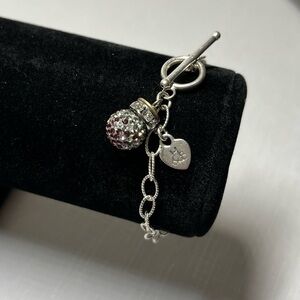 Hillberg & Berk sterling silver bracelet with fuschia fade sparkle ball and tag